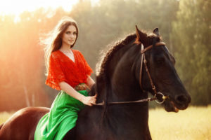 gypsy-girl-rides-horse-field-summer_91497-3065